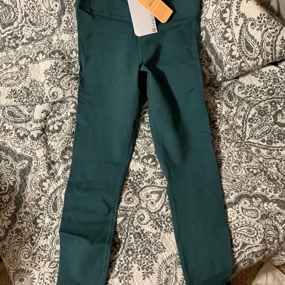 Medium Fabletics high waisted leggings.